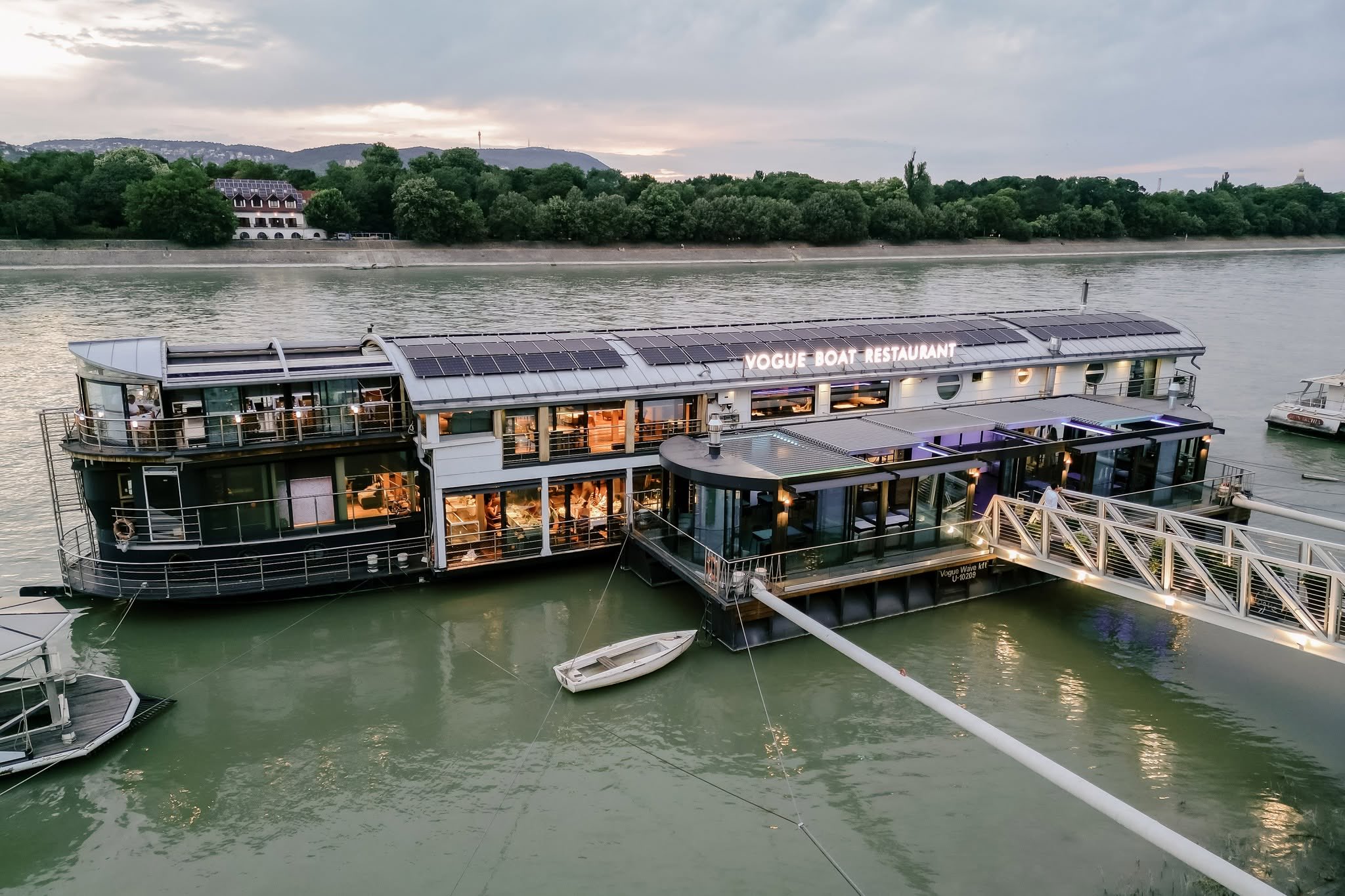 Vogue Boat Restaurant seen from the Danube at dusk